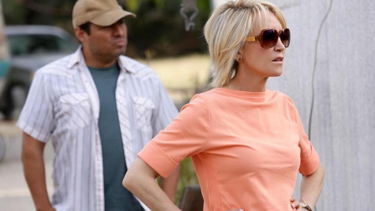 Gabriel Lemus, left, and Felicity Huffman in ABC’s “American Crime.”