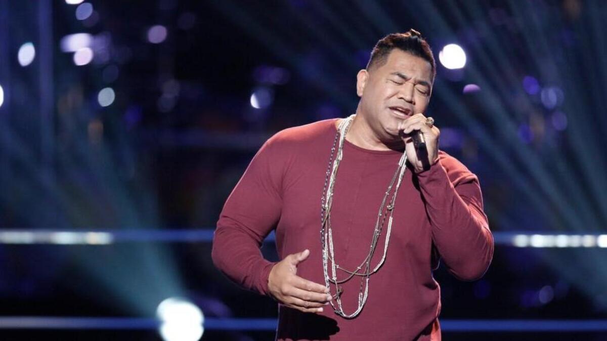 Esera Tuaolo performs in the Knockout Rounds of NBC’s “The Voice” on Oct. 30, 2017.