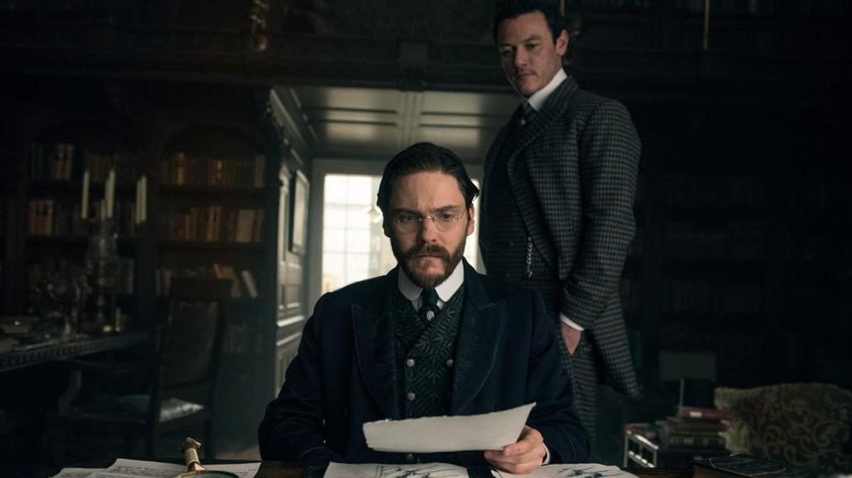 Daniel Brühl, left, and Luke Evans in “The Alienist” on TNT.