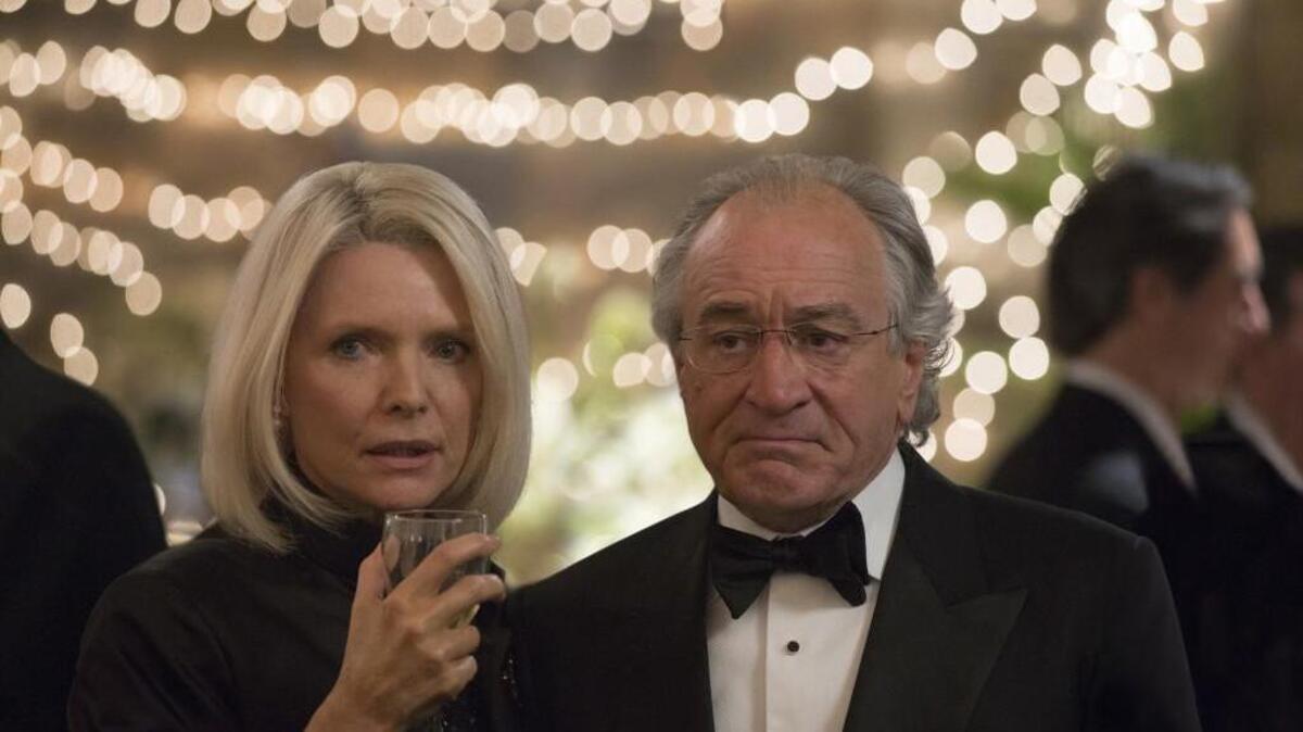 Michelle Pfeiffer, left, and Robert De Niro and Ruth and Bernie Madoff in the HBO movie “The Wizard of Lies.”
