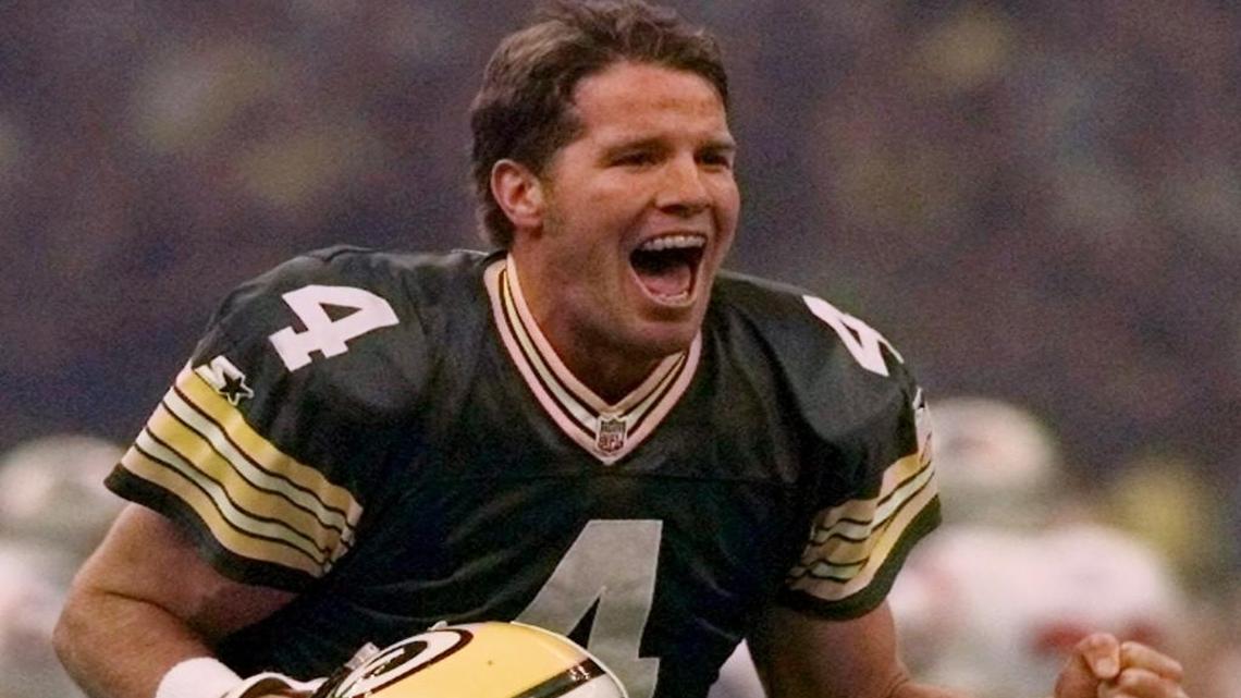 Green Bay Packers quarterback Brett Favre celebrates after throwing a touchdown pass to Andre Rison during the 1997 Super Bowl in New Orleans.