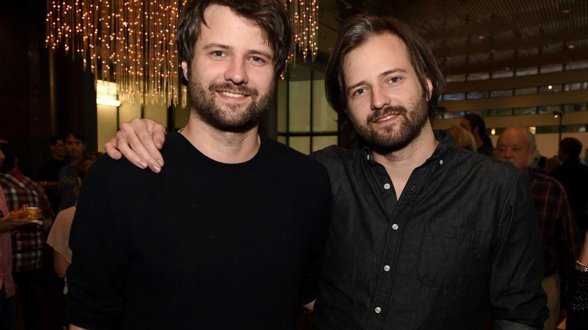 Ross Duffer (L) and Matt Duffer, creators, writers and executive producers of Netflix's "Stranger Thing" at a Directors Guild reception on August 17, 2017 in Los Angeles.