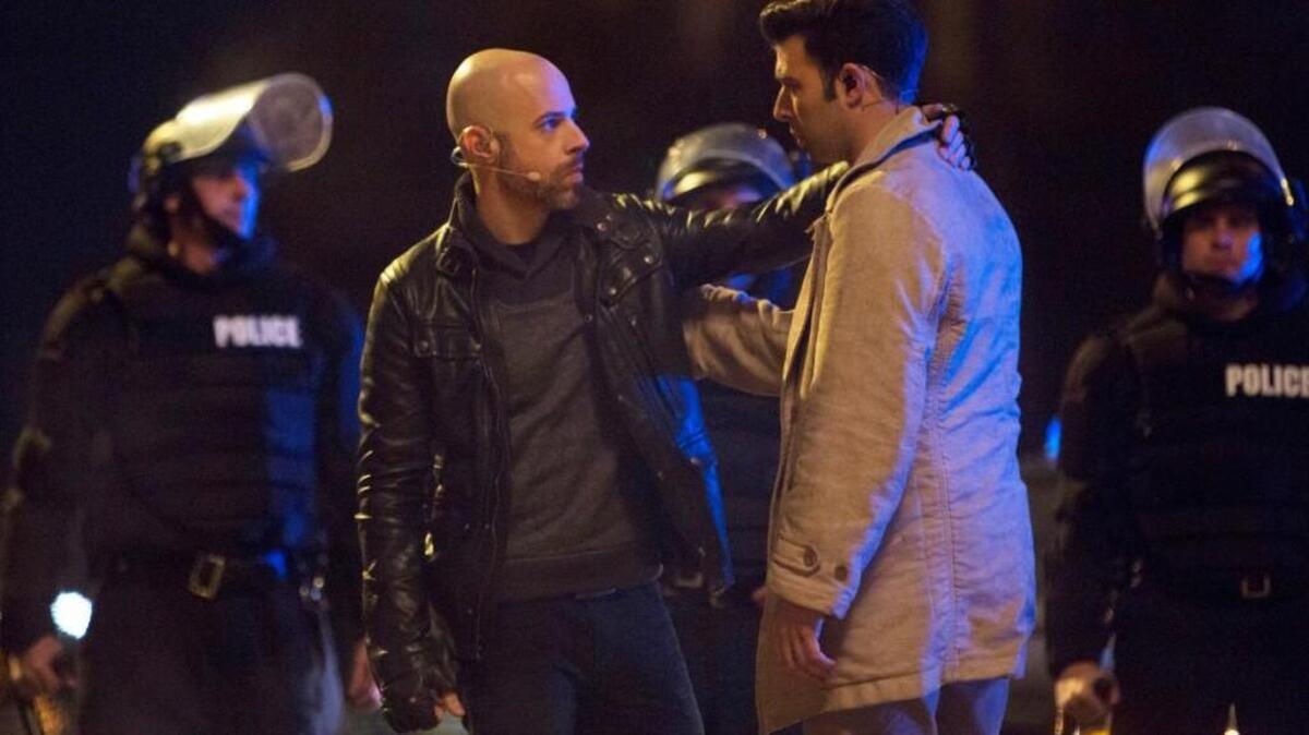 Chris Daughtry, left, as Judas and Jencarlos Canela as Jesus in a rehearsal for “The Passion.”