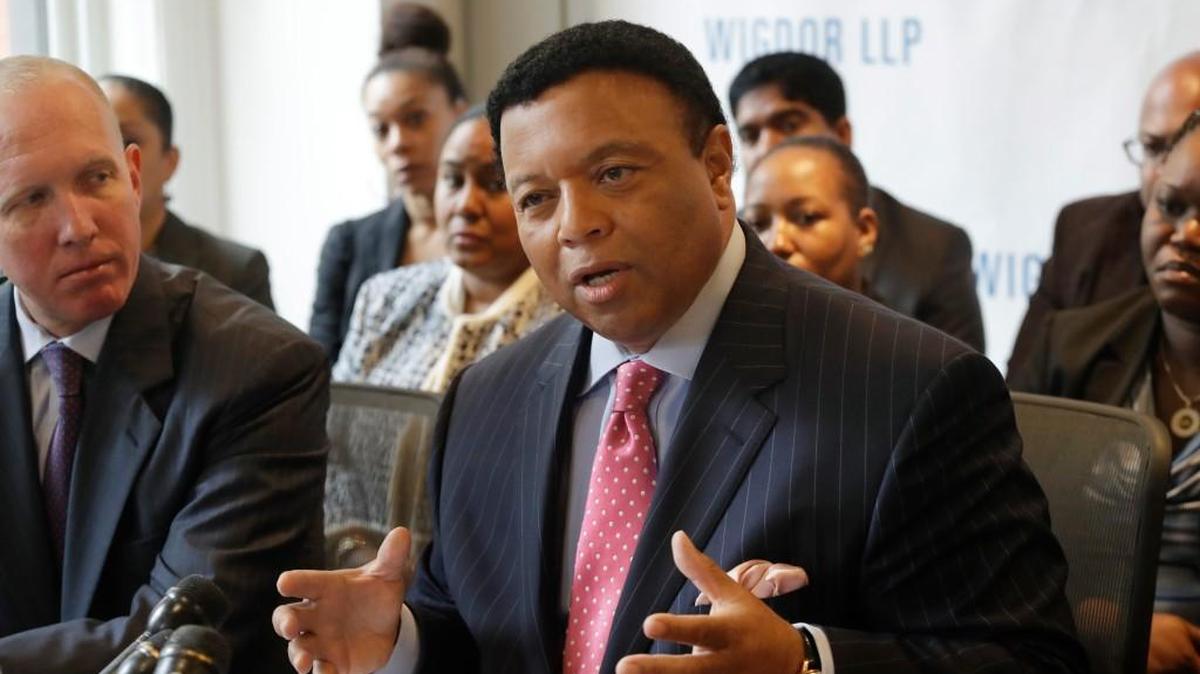 Fox News anchor Kelly Wright appears at a news conference Wednesday, in New York to discuss his part in a lawsuit accusing the network of allowing racial discrimination.
