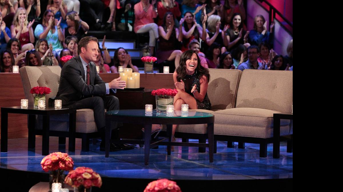 
Chris Harrison (left) listens as Kaitlyn Bristowe talks about events from the current season of “The Bachelorette.” 


