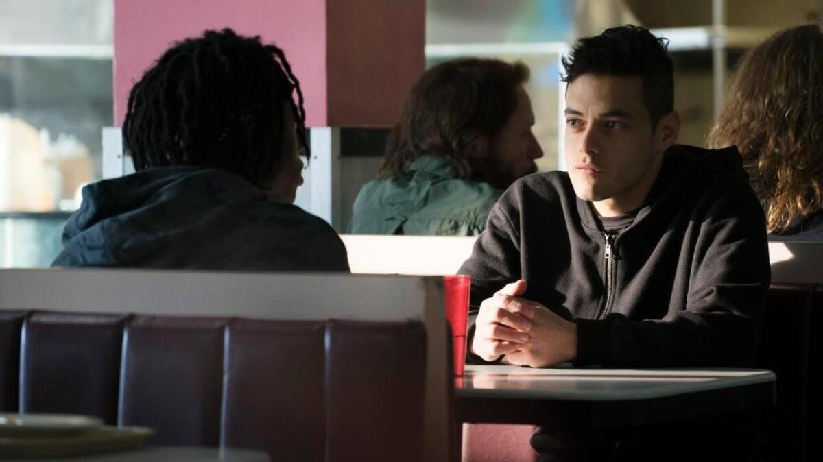 Joey Bada$$ (left) as Leon and Rami Malek as Eliot Alderson in “Mr. Robot” on USA Network.