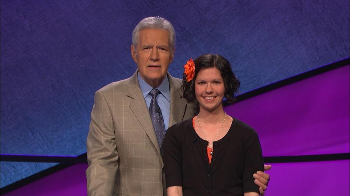 Alex Trebek, left, and Melissa Dean of Raleigh.