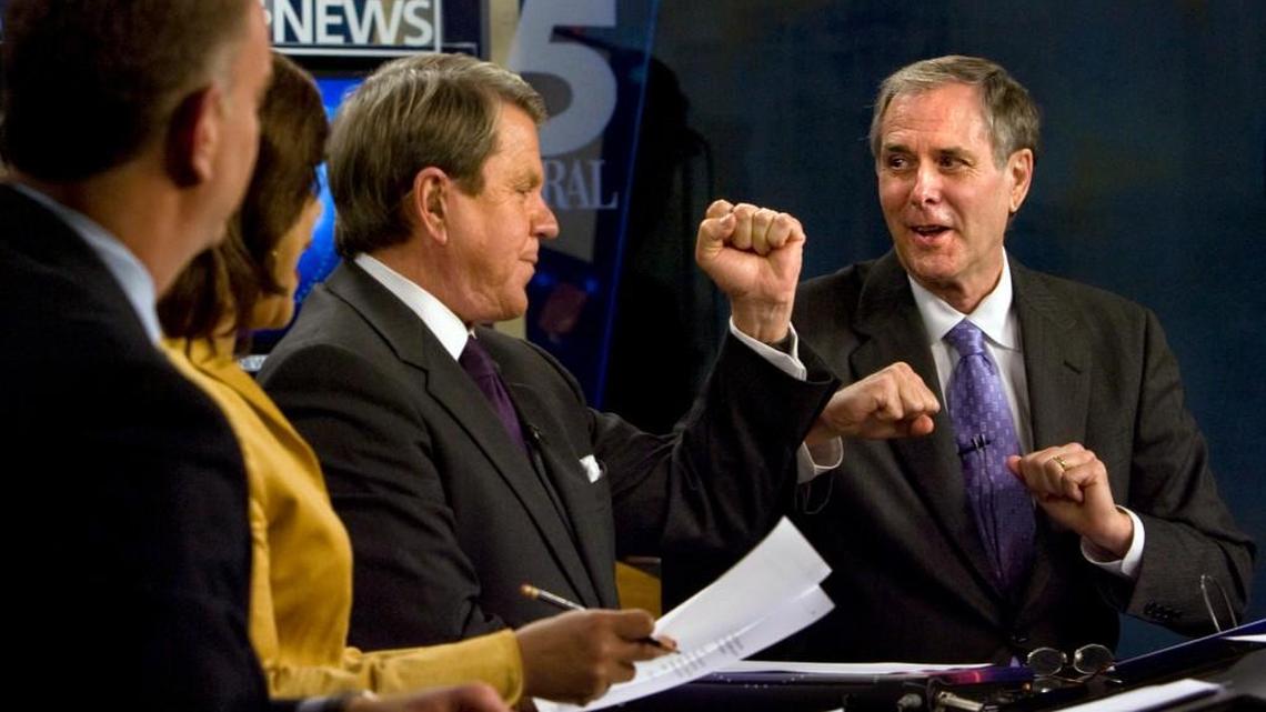 WRAL Channel 5 news anchor David Crabtree, center, “elbow bumps” sports anchor Tom Suiter, right, on Suiter’s last night as a full-time anchor in on Dec. 12, 2008. WRAL announced Wednesday, Sept. 20, 2017 that Crabtree will retire in late 2018.