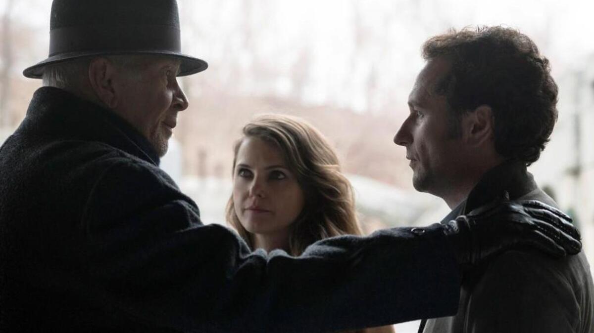(L-R): Frank Langella as Gabriel, Keri Russell as Elizabeth Jennings and Matthew Rhys as Philip Jennings in “The Americans.”
