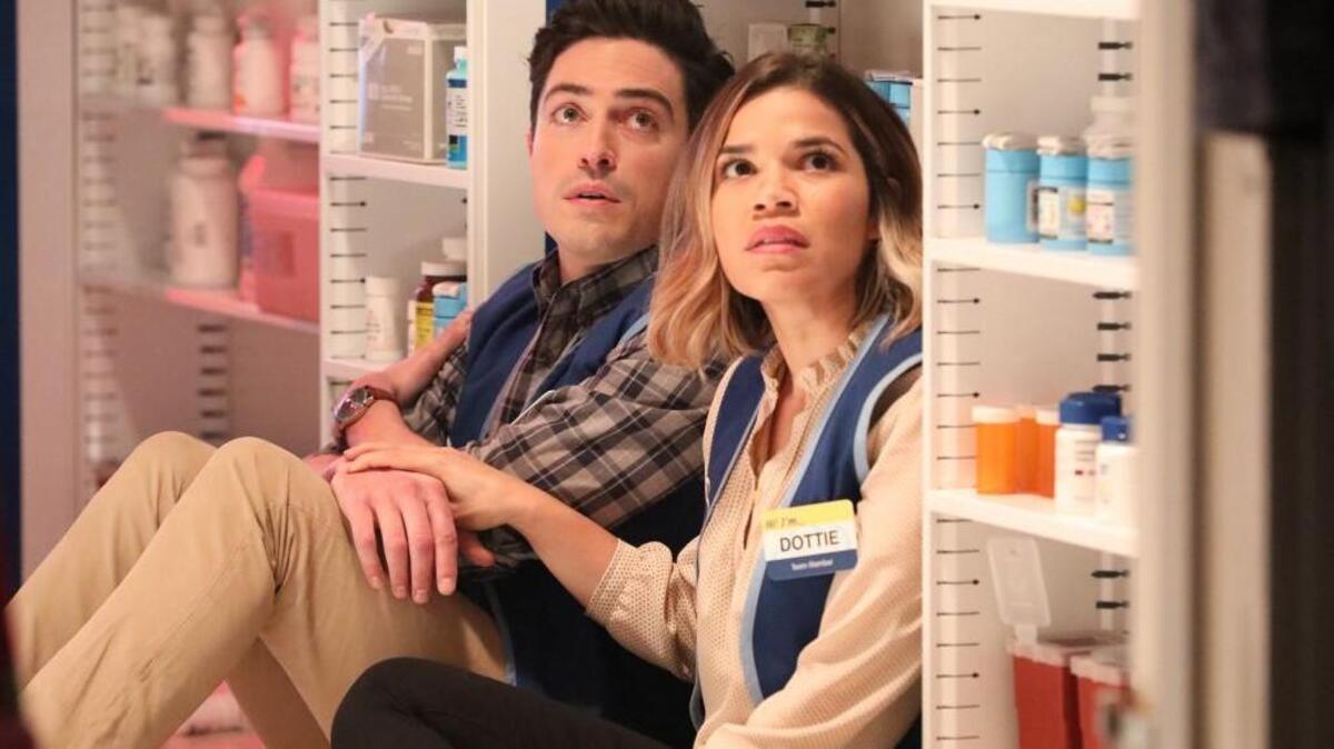 Ben Feldman, left, as Jonah, and America Ferrera as Amy in NBC’s “Superstore” season finale.