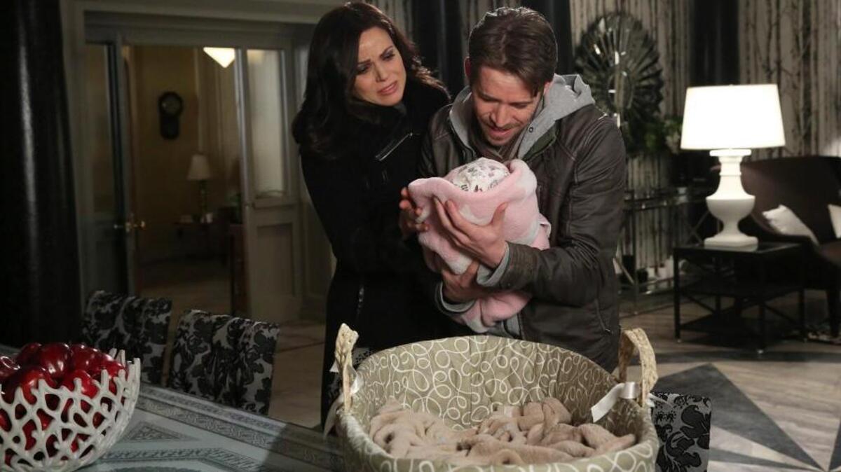 Lana Parrilla, left, as Regina and Sean Maguire as Robin in “Once Upon a Time” on ABC. )