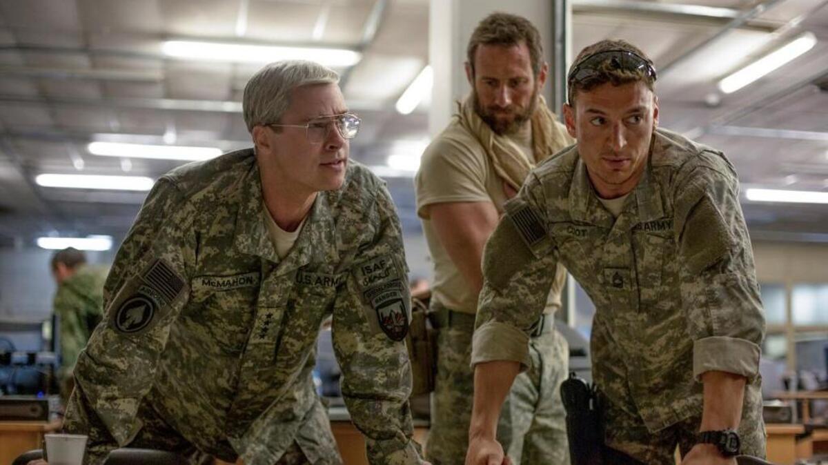 Brad Pitt, far left, stars in the Netflix original movie “War Machine.”