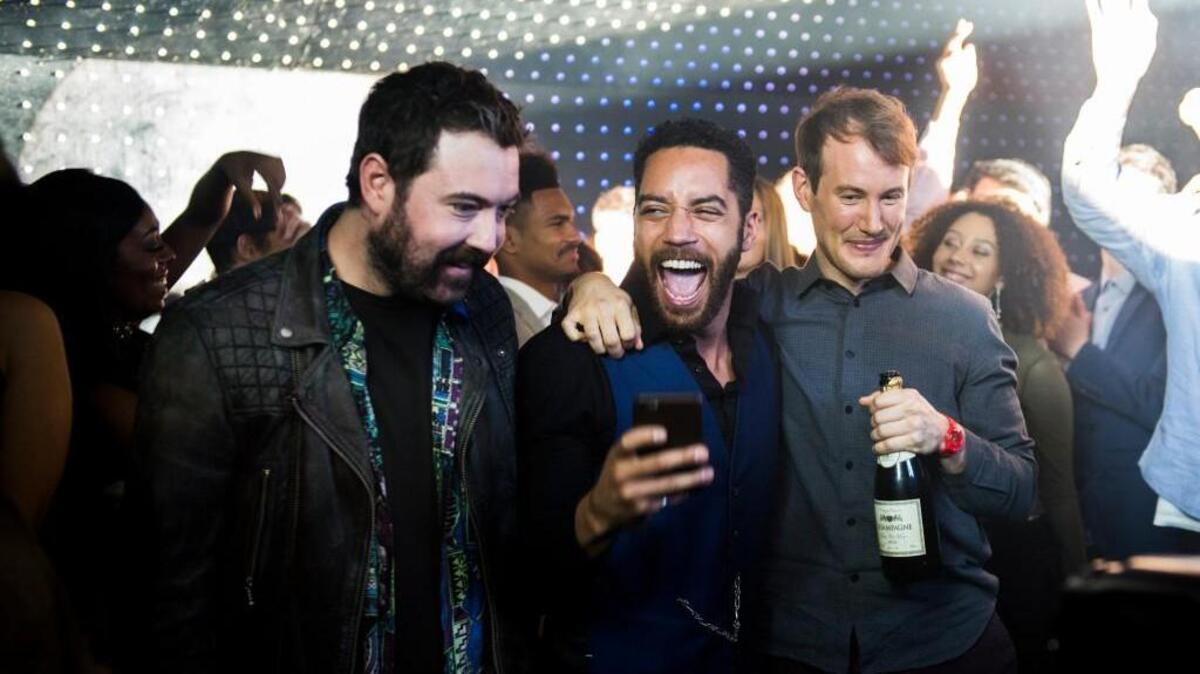 (L-R): Nick Helm as Watto, Samuel Anderson as Leon and Jonny Sweet as Ewan in AMC’s “Loaded.”