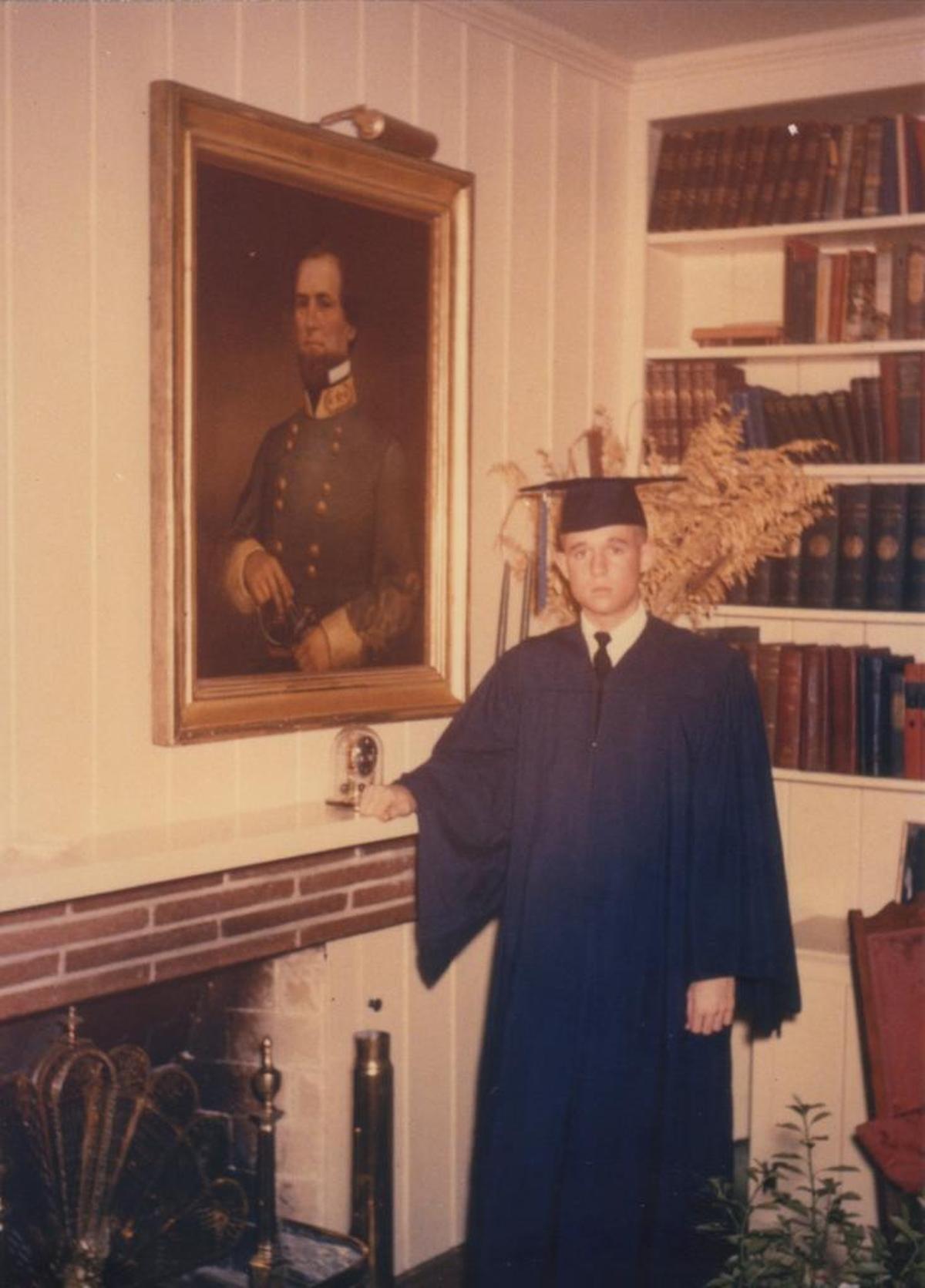 A young Armistead Maupin in cap and gown in his home in Raleigh, North Carolina.