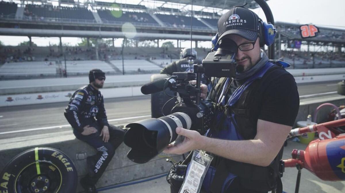 Co-producer and co-director of photography Josh Woll working on “Road to Race Day.”