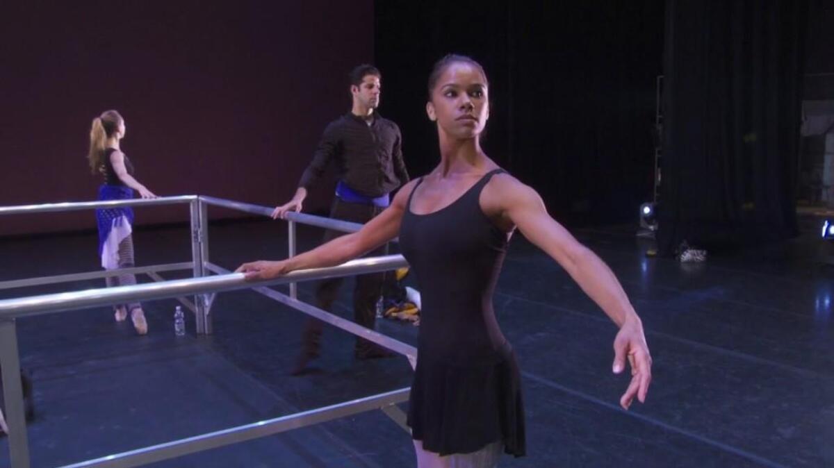 Misty Copeland warming up for performance in Italy for Roberto Bolle & Friends. July 2014.