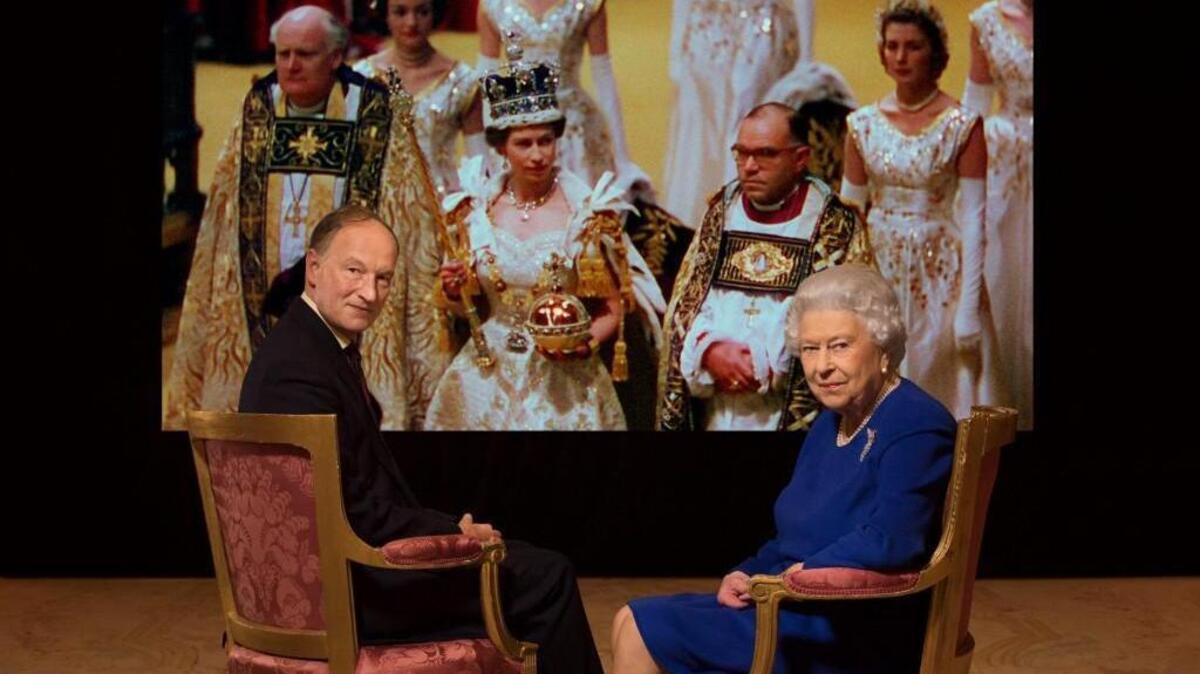 Alastair Bruce, left, with Queen Elizabeth for the Smithsonian Channel special “The Coronation.”