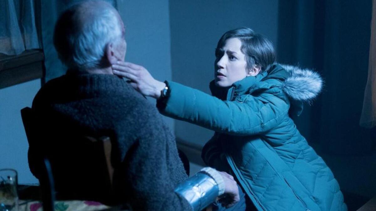Carrie Coon, right, as police chief Gloria Burgle.