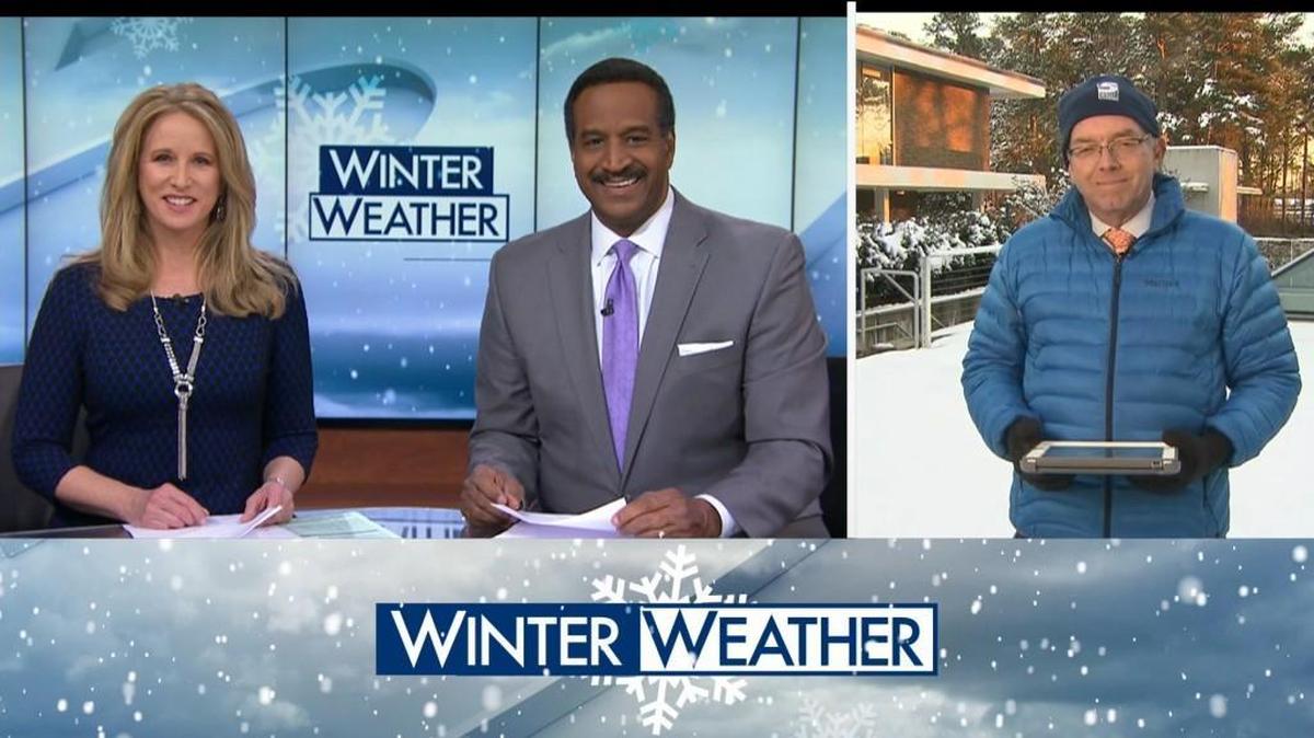 WRAL anchors Debra Morgan and Gerald Owens talk to chief meteorologist Greg Fishel during Wednesday’s snow coverage.