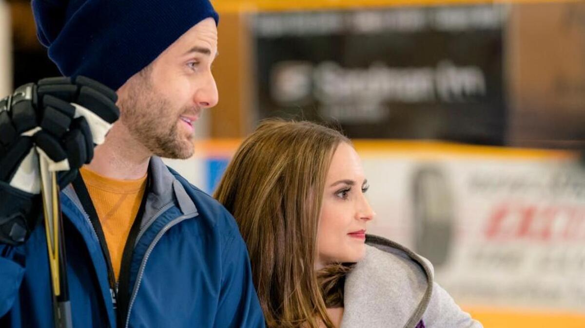 Niall Matter, left, and Rachael Leigh Cook in the Hallmark movie “Frozen in Love.”