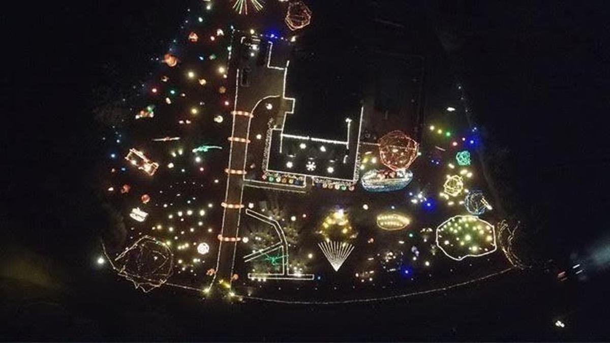 The Moore family of Raleigh shows off their eclectic array of decorations at Happyland Christmas Lights in “The Great Christmas Light Fight” TV show on ABC.