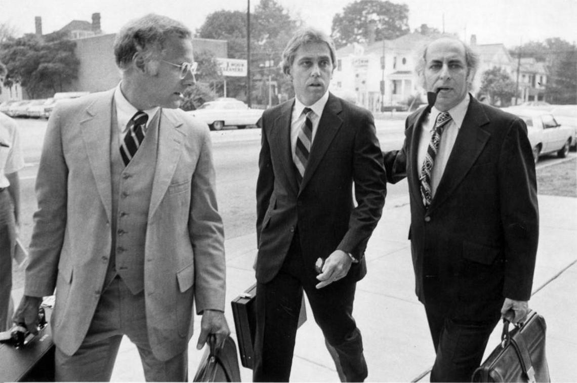 Dr. Jeffery MacDonald, center, arrives at U.S. District Court in Raleigh with attorneys Wade Smith, left, and Bernard Segal, far right, in 1979.