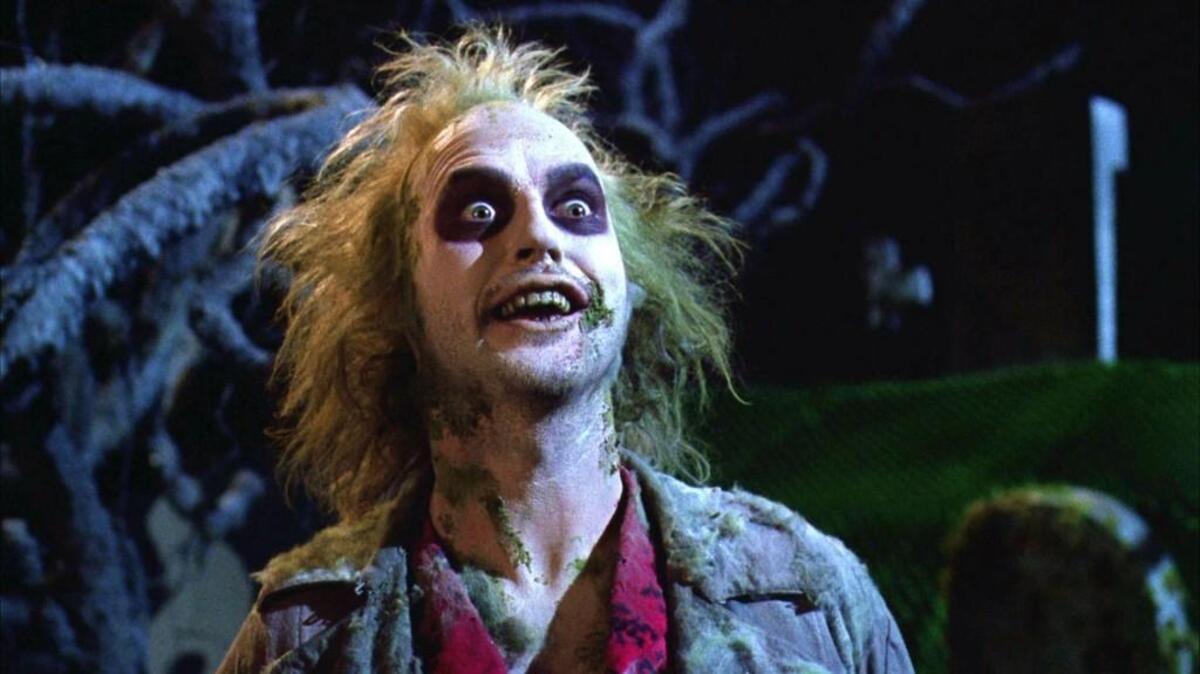Michael Keaton in “Beetlejuice,” which is screening at a couple of locations in the Triangle.