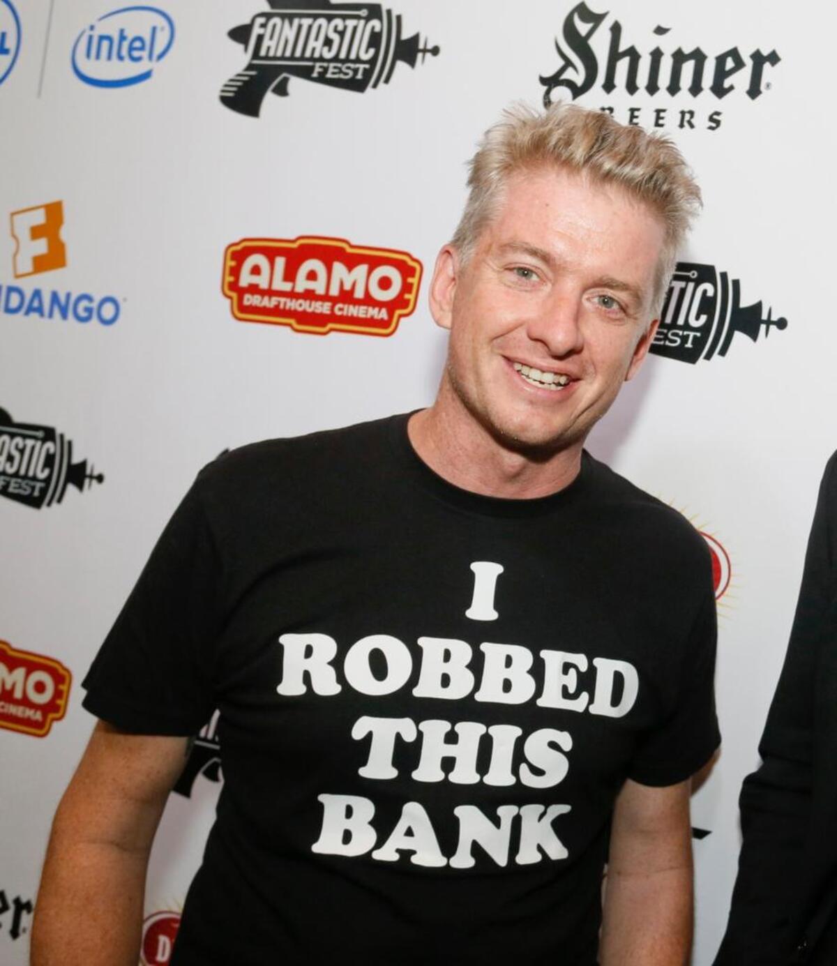 Alamo Drafthouse Cinema founder and CEO Tim League poses on the red carpet before an advance screening during Fantastic Fest at the Alamo Drafthouse- South Lamar in Austin, Texas in 2014. An awkward cloud hangs over the festival this year, and it’s mostly there thanks to League who’s been involved a whole lot of drama recently.