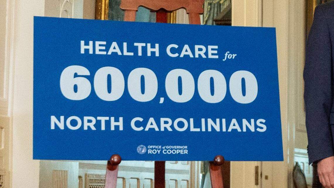 Gov. Roy Cooper announces a Medicaid expansion launch date of Dec. 1 as Secretary of Health and Human Services Kody Kinsley looks on during a press conference Monday, Sept 25, 2023 at the Executive Mansion in Raleigh.