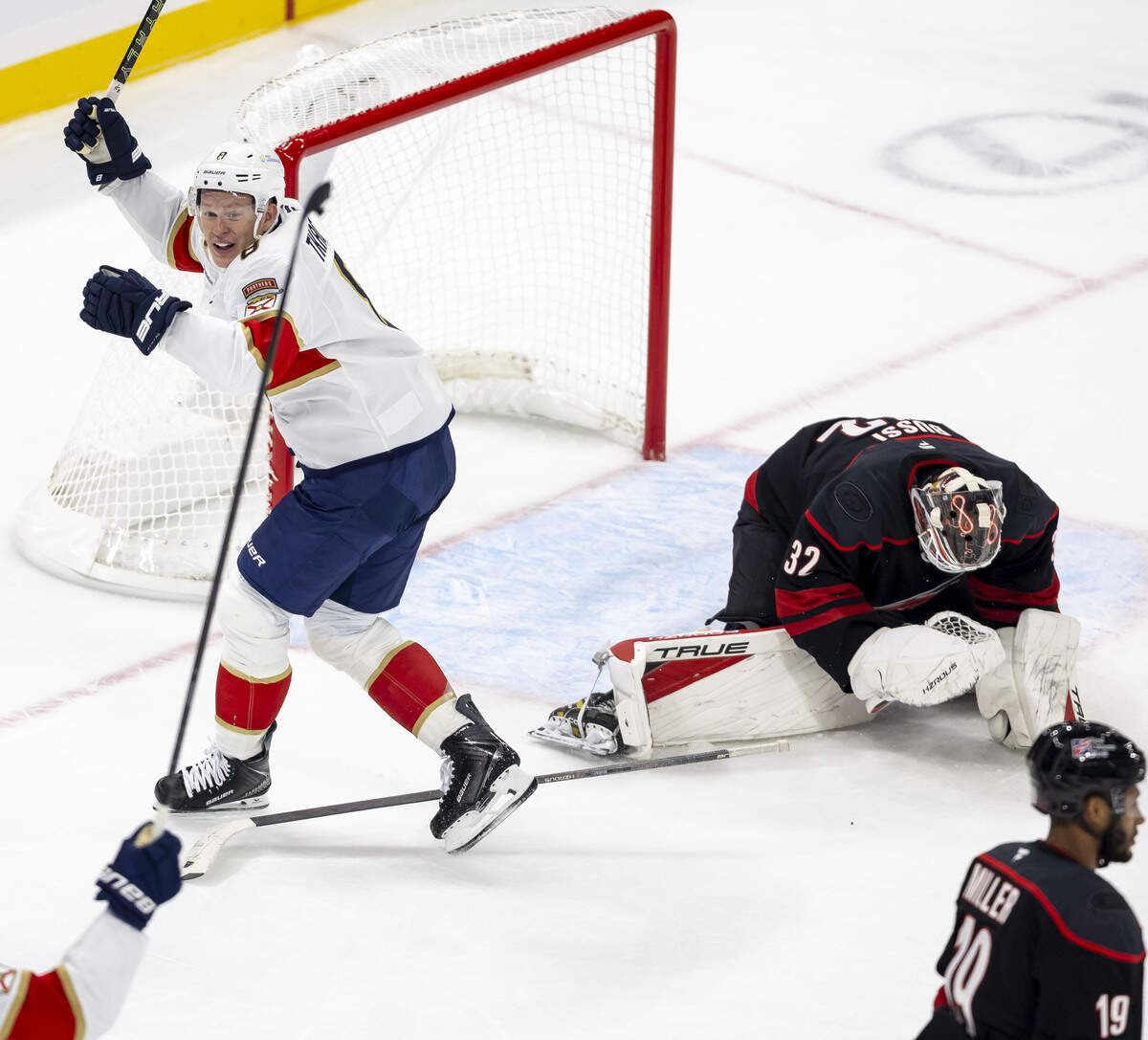 Florida Panthers center Brady Tkachuk (8) reacts after the game winning goal by teammate Gustav Forsling (42) on Carolina Hurricanes goalie Brandon Bussi (32), to secure a 1-0 overtime victory on Tuesday, Sept. 29, 2026, at Lenovo Center in Raleigh, N.C.