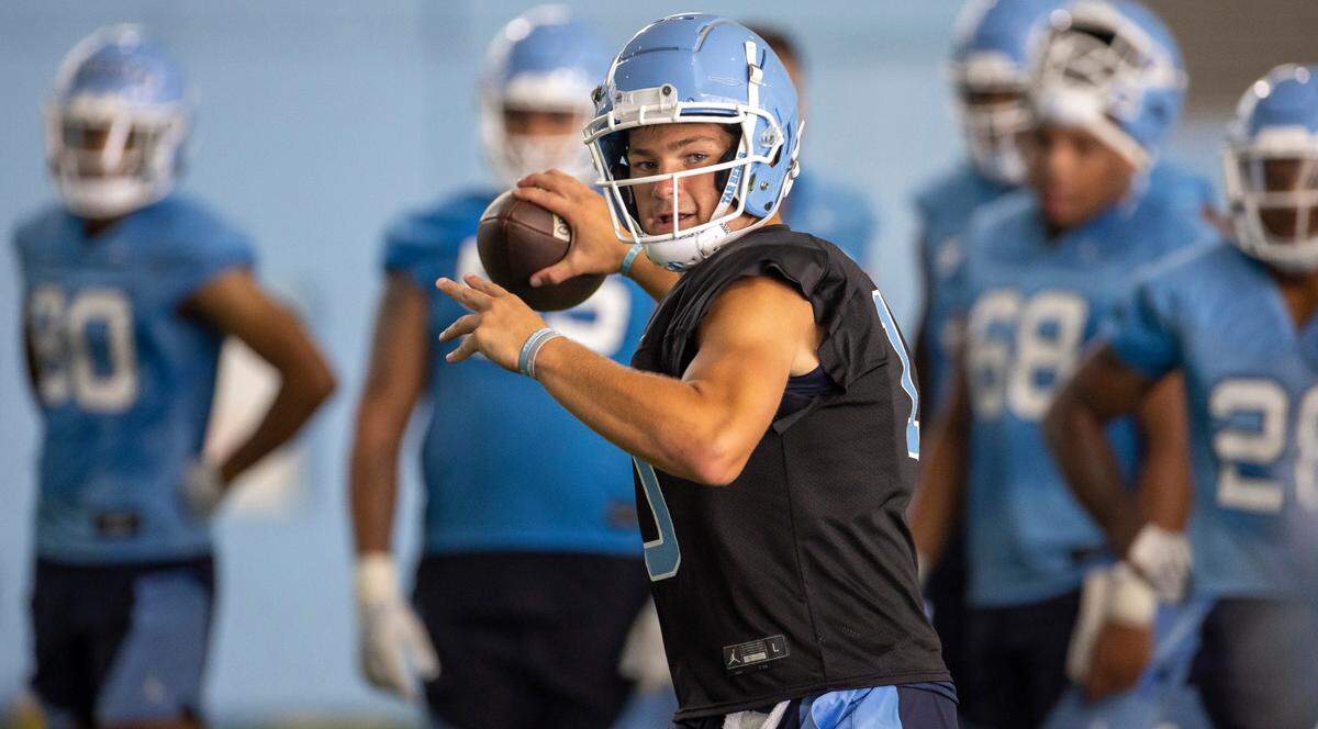 North Carolina quarterback Drake Maye (10) looks for a receiver during the Tar Heels’ first practice of the season on Wednesday, August 2, 2023 in Chapel Hill, N.C.