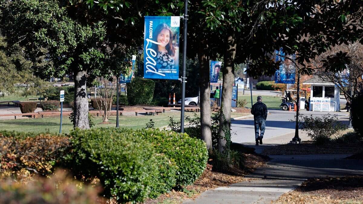 The tree lined street of Prezell R Robinson Library Circle welcomes students, teachers, staff and visitors to St. Augustine’s University in Raleigh, N.C., photographed Tuesday, Dec. 5, 2023.