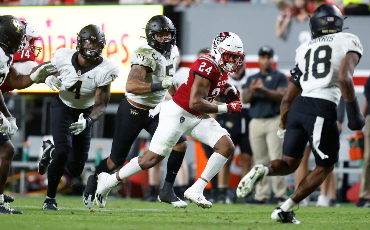 N.C. State running back Michael Allen (24) rushes downfield during the second half of N.C. State’s 30-21 victory over Wake Forest at Carter-Finley Stadium in Raleigh, N.C., Saturday, Nov. 5, 2022.