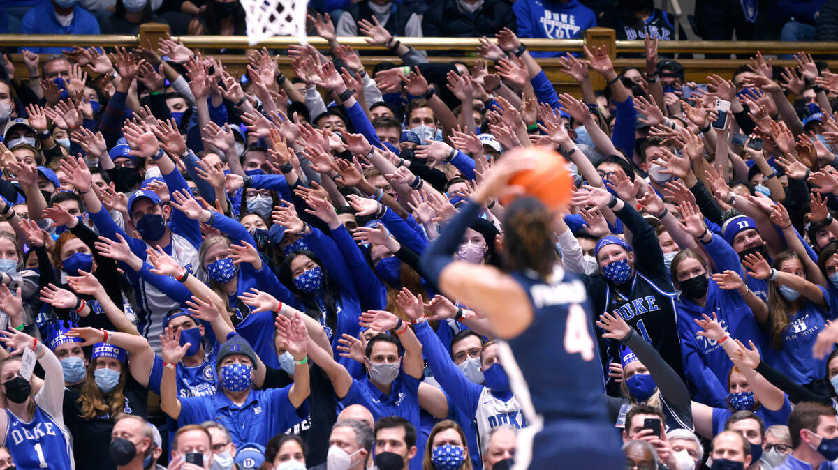 Fans try to make Virginia’s Armaan Franklin (4) miss his free throw during the first half of Duke’s game against Virginia at Cameron Indoor Stadium in Durham, N.C., Monday, Feb. 7, 2022.