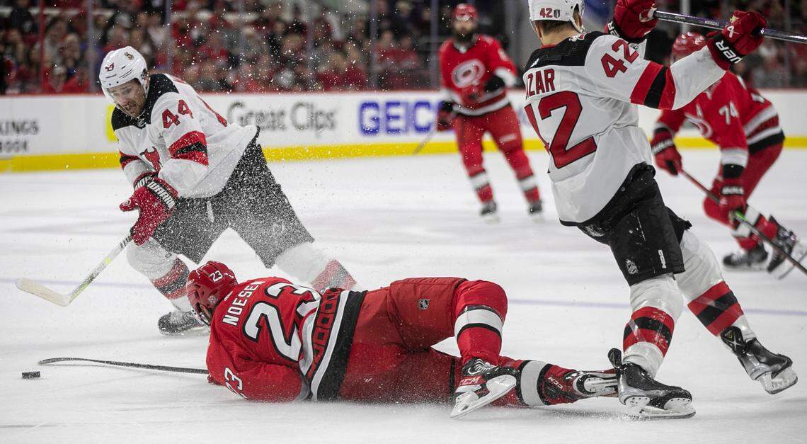 The Carolina Hurricanes Stefan Noesen (23) goes after the puck under the New Jersey Miles Wood (44) in the first period during Game 2 of their second round Stanley Cup playoff series on Friday, May 5, 2023 at PNC Arena in Raleigh, N.C.