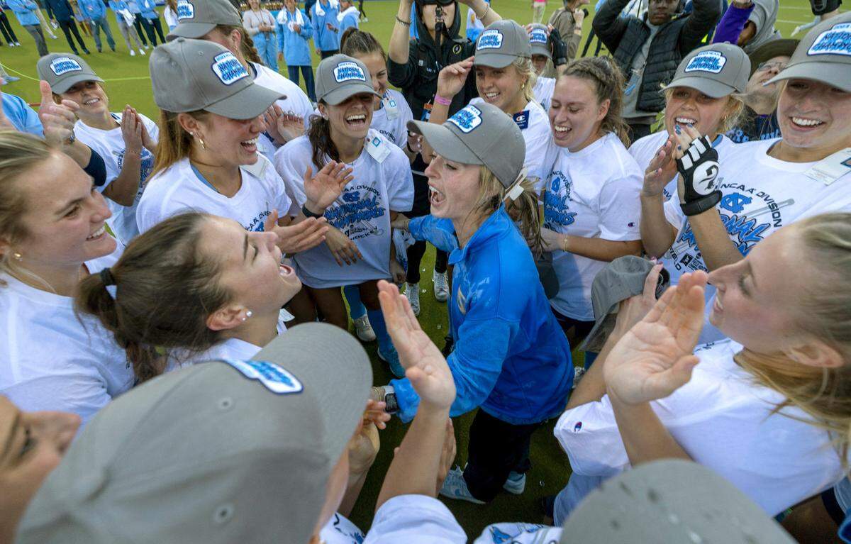 North Carolina field hockey coach Erin Matson celebrates with her team after clinching the 2023 NCAA Division I Field Hockey Championship on Sunday, November 19, 20223 at Karen Shelton Stadium in Chapel Hill, N.C.