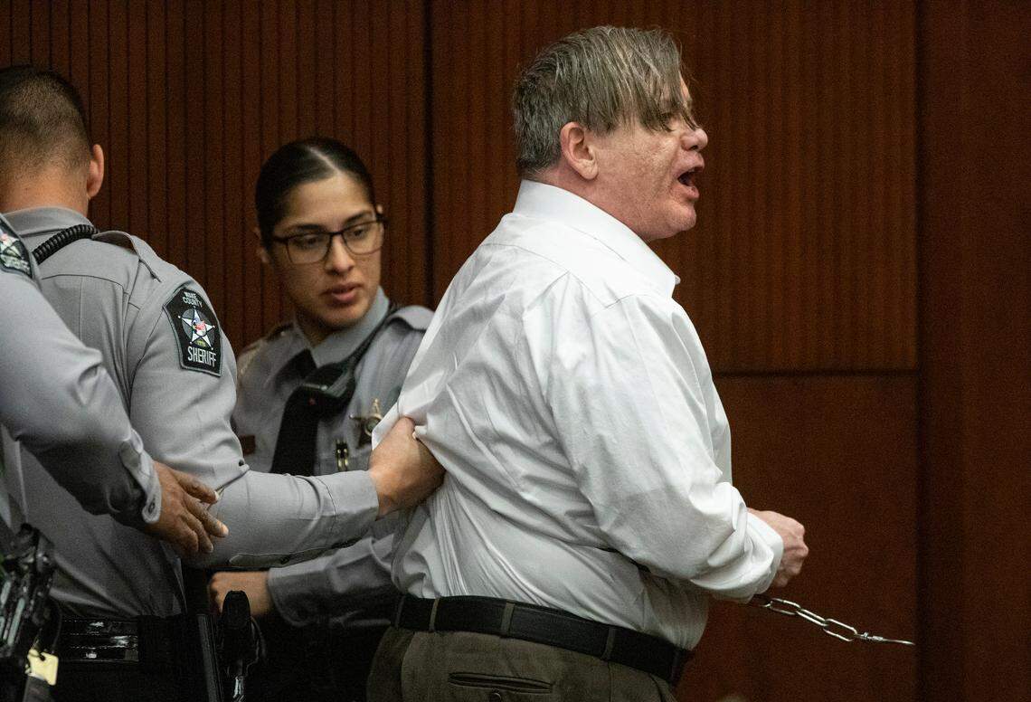 Jonathan Sander shouts at Salvatore Mazzella in court Monday.