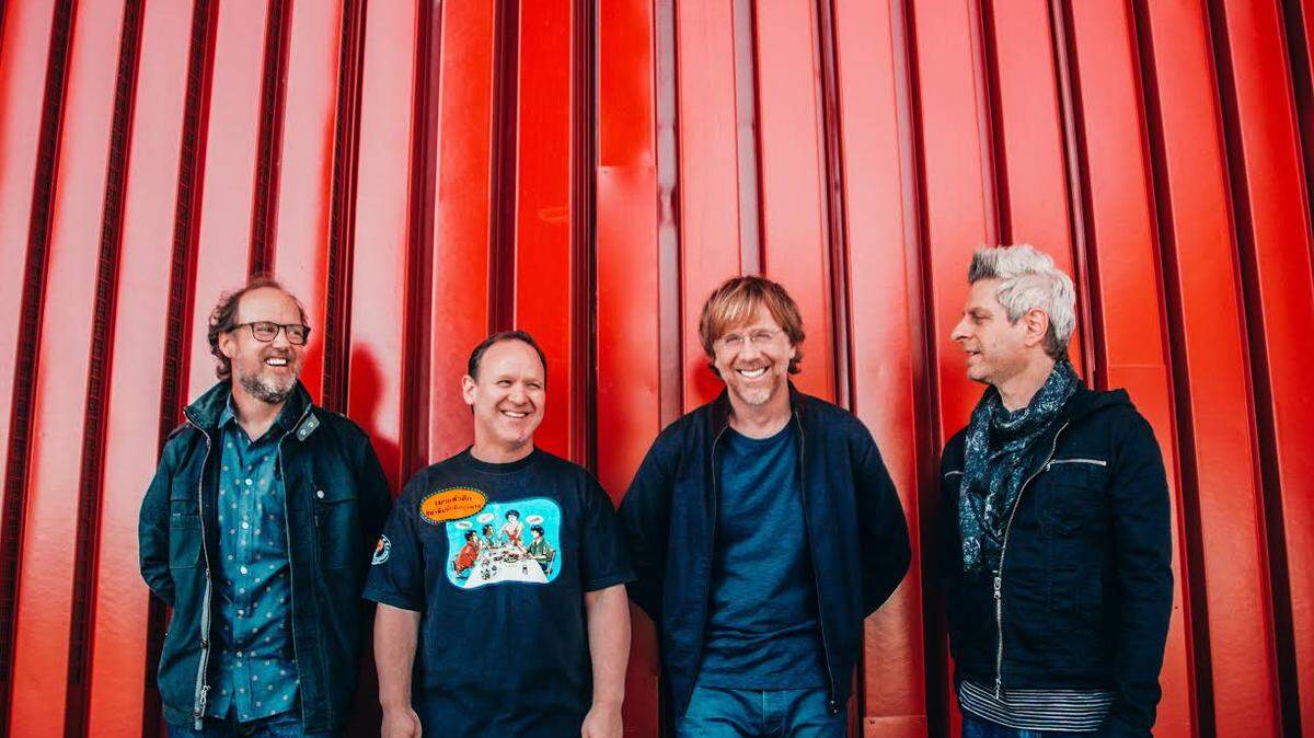Phish (L-R: Page McConnell, Jon Fishman, Trey Anastasio, Mike Gordon) will play at Coastal Credit Union Music Park at Walnut Creek on Friday, August 10.