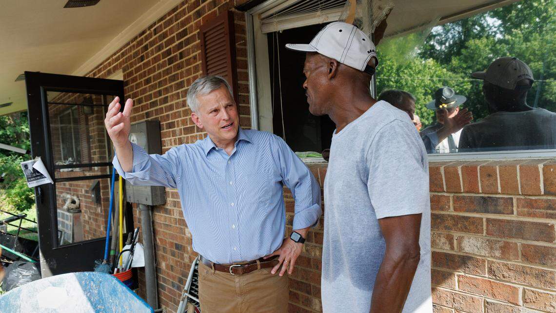 NC governor tours Chapel Hill to see flood damage, meet with displaced residents