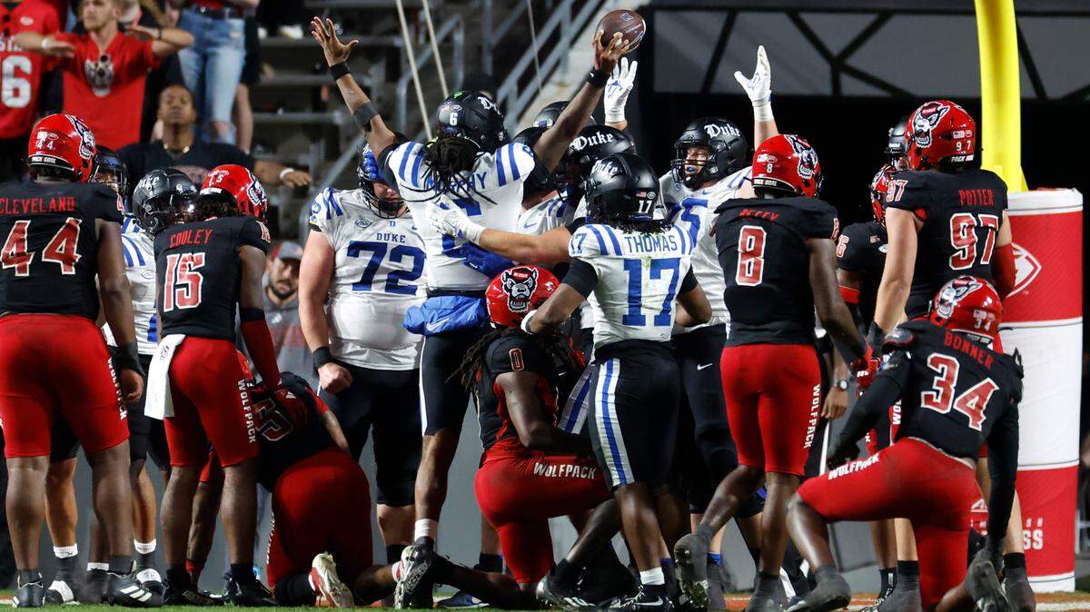Duke quarterback Maalik Murphy (6) celebrates after scoring on a three-yard touchdown run during the second half of Duke’s 29-19 victory over N.C. State at Carter-Finley Stadium in Raleigh, N.C., Sat. Nov. 9, 2024.