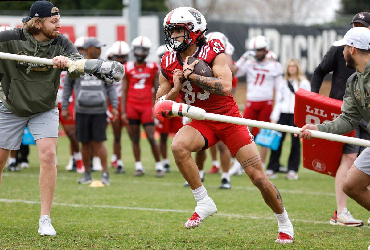 N.C. State wide receiver Josh Crabtree (83) runs a drill during the Wolfpack’s first spring practice in Raleigh, N.C., Wednesday, March 1, 2023.