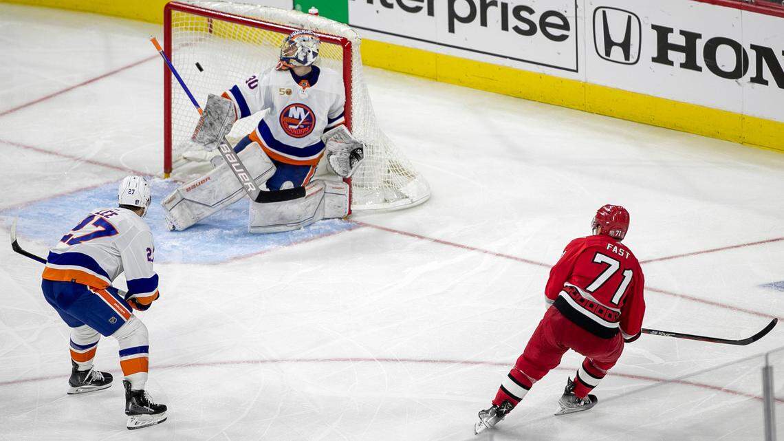 Carolina Hurricanes’ Jesper Fast (71) fires the game winning shot at New York Islander goalie Ilya Sorokin (30) to secure a 4-3 victory in overtime during game two of their Stanley Cup series on Wednesday, April 18, 2023 at PNC Arena in Raleigh, N.C.