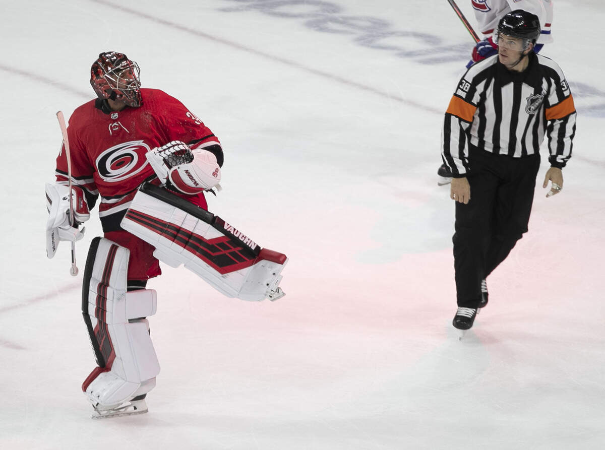 Carolina Hurricanes’ goalie Petr Mrazek (34) reacts after stopping a shot by Montreal’s Nick Suzuki (14) during the shootout, securing the Hurricanes’ 4-3 victory on Thursday, October 3, 2019 at the PNC Arena in Raleigh, N.C.