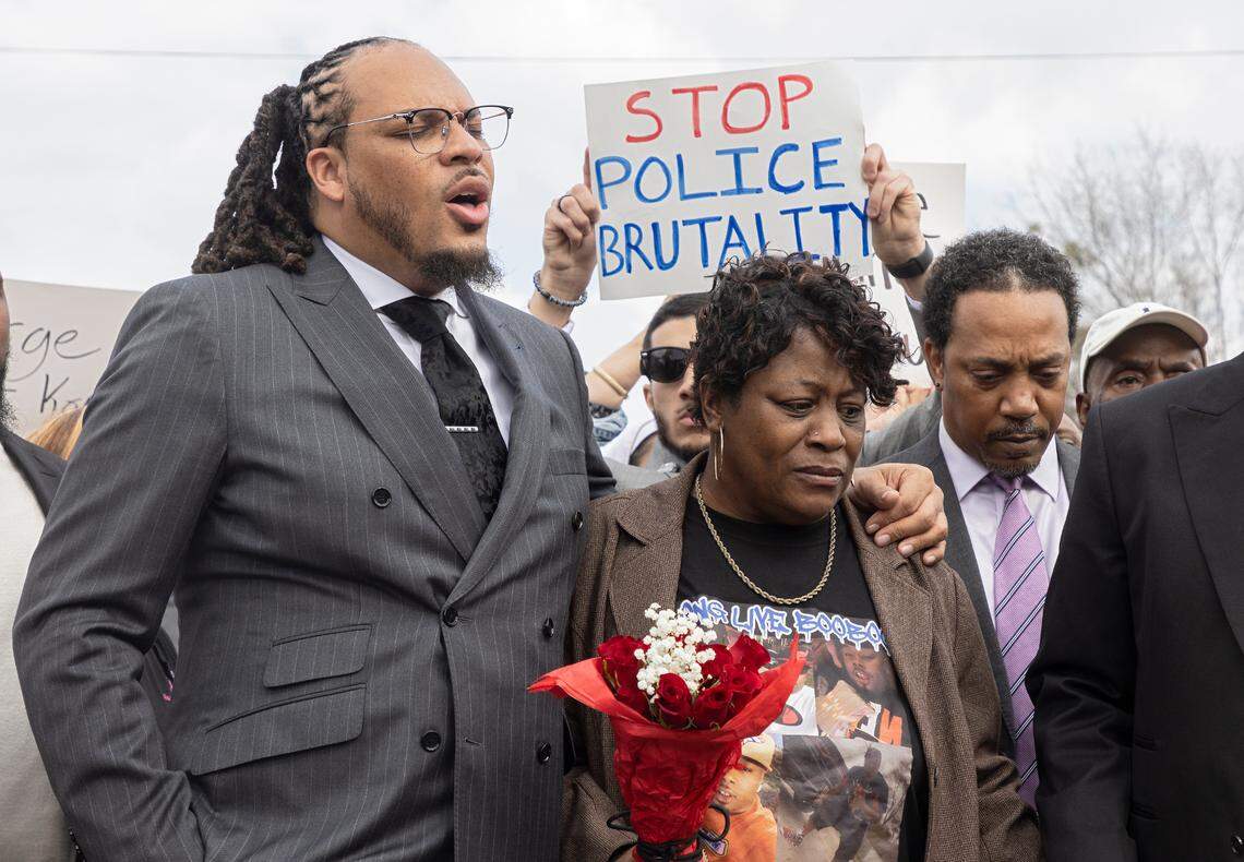 Rev. Greg Drumwright stands with Sonya Williams, mother of Darryl Williams, at a memorial on Rock Quarry Road near where Darryl Williams died after being tased by the Raleigh Police Department on Thursday, Feb. 16, 2023, in Raleigh, N.C.