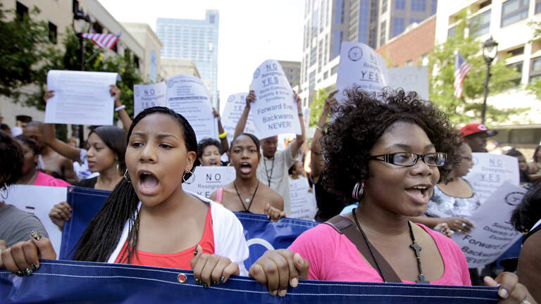 Handcuffed activists, dead dogwoods, Velvet Cloak — This day in Triangle history