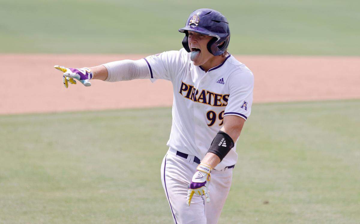 East Carolina’s Alec Makarewicz (99) celebrates hitting a homerun in the eighth inning during ECU’s 13-7 victory over Texas in the Greenville Super Regional at Clark-LeClair Stadium Friday, June 10, 2022.