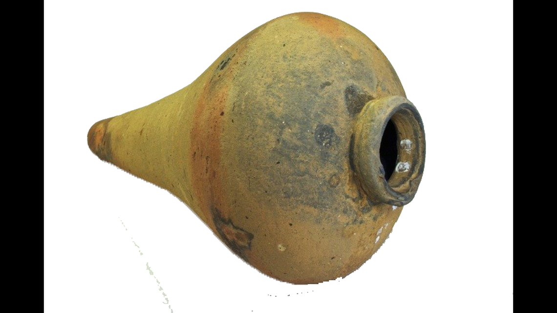 This jar was found on an Outer Banks beach in 2008. Its shape indicates it was made sometime between 1780 and 1850.