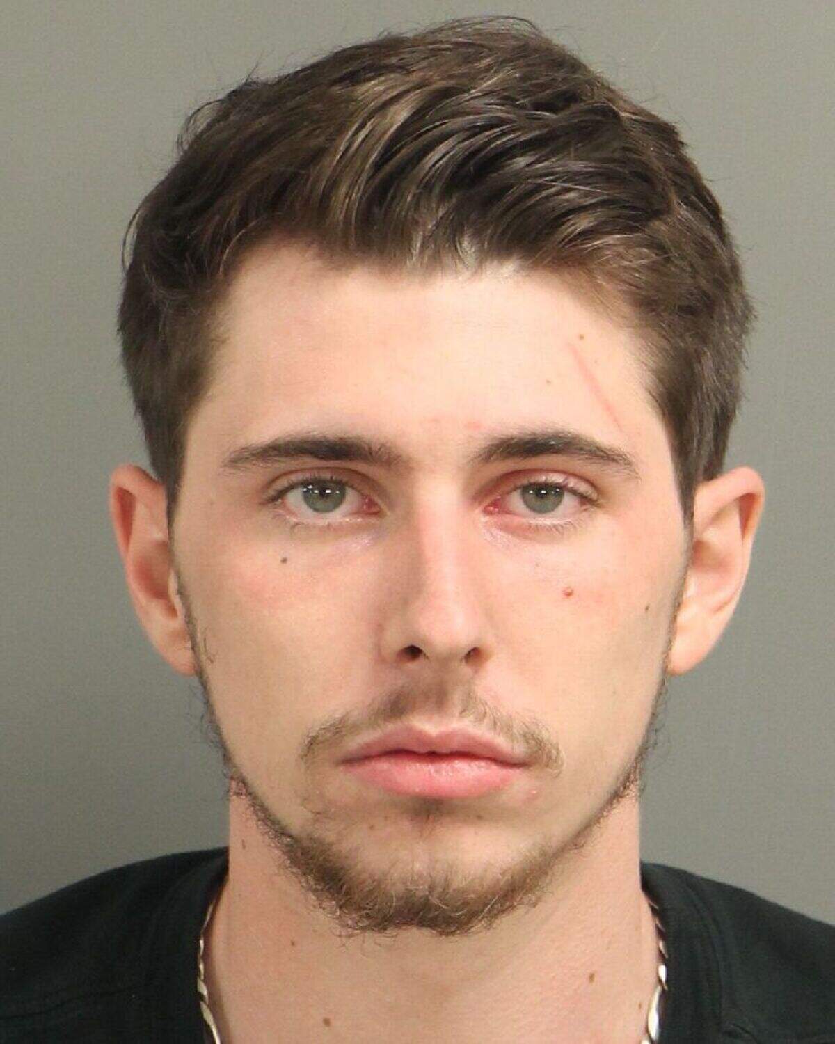 Hunter Hall was charged with carrying a concealed weapon, misdemeanor drug possession and assault with a deadly weapon inflicting serious bodily injury in connection with a non-fatal shooting.