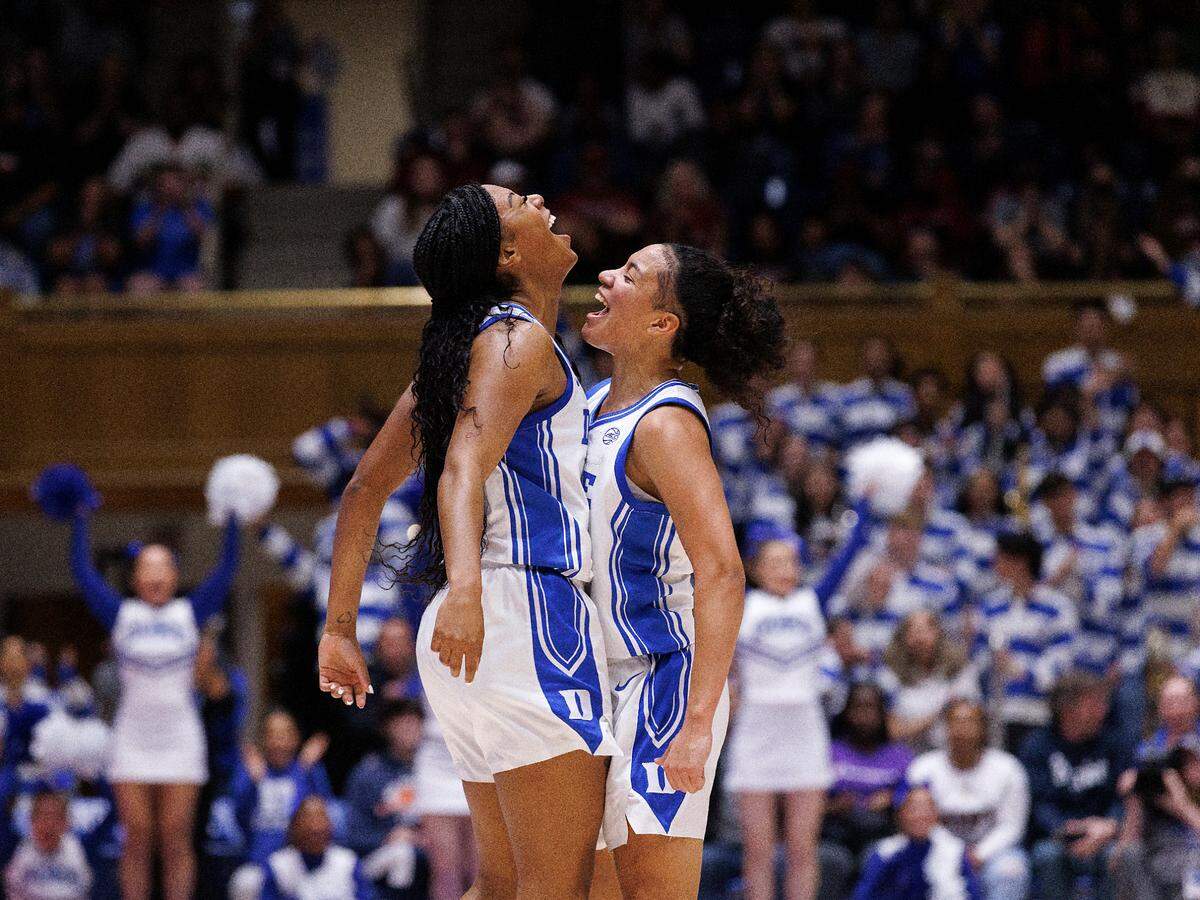 Duke’s Reigan Richardson and Taina Mair celebrate after a made basket during the second half of the Blue Devils’ 77-61 loss on Sunday, Dec. 3, 2023, at Cameron Indoor Stadium in Durham, N.C.