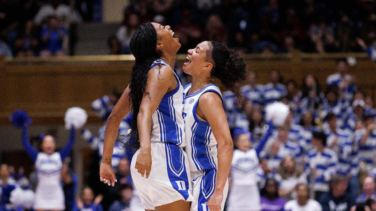 Duke’s Reigan Richardson and Taina Mair celebrate after a made basket during the second half of the Blue Devils’ 77-61 loss on Sunday, Dec. 3, 2023, at Cameron Indoor Stadium in Durham, N.C.
